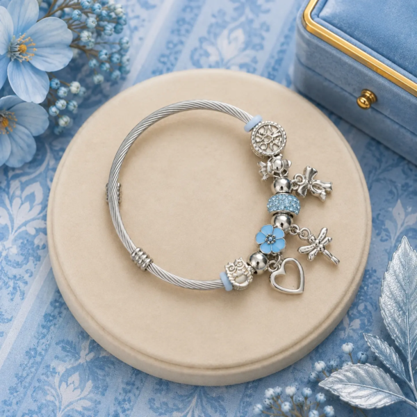 Ratnikaa Silver Charm Bracelet for Women | Blue Crystal Beads with Owl Dragonfly Heart & Flower Charms | Cable Bangle with Enamel Details