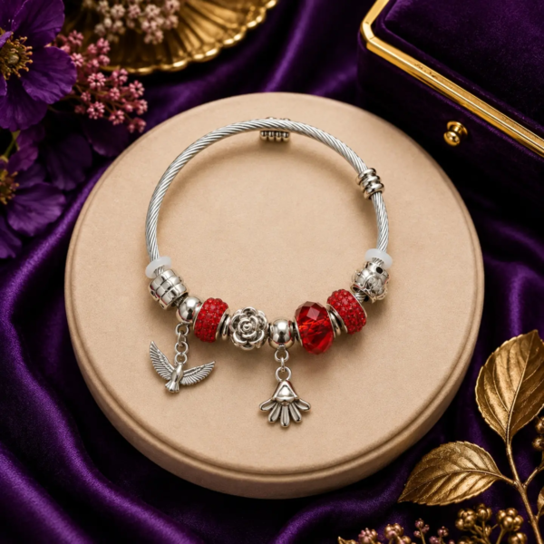 Ratnikaa Red Crystal Charm Bracelet for Women & Girls | Adjustable Silver-Tone Bracelet with Crystal Beads, Floral Charm & Dangle Charms