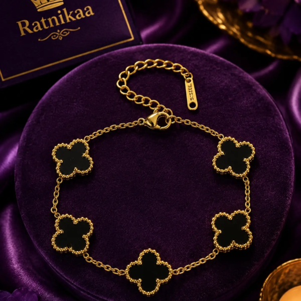 Black Clover Charm Bracelet for Women – Gold-Tone Floral Bracelet with Elegant Black Crystal Charms, Stylish