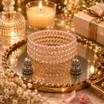 Ratnikaa Layered Crystal Bead Bracelet for Women | Peach Pink Beaded Cuff with Oxidized Silver Jhumka Charms | Multilayer Stretch Bracelet - Image 5